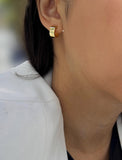 Female model wearing BOSS 18K GOLD VERMEIL OVER STERLING SILVER MINIMALIST CHUBBY MINI SMALL HOOP EARRINGS by Sonia Hou Jewelry