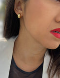 Female model wearing BOSS 18K GOLD VERMEIL OVER STERLING SILVER MINIMALIST CHUBBY MINI SMALL ROUND HOOP EARRINGS by Sonia Hou Jewelry