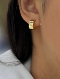 Image Title Female model wearing BOSS 18K GOLD VERMEIL OVER STERLING SILVER MINIMALIST CHUBBY MINI SMALL ROUND HOOP EARRINGS by Sonia Hou Jewelry