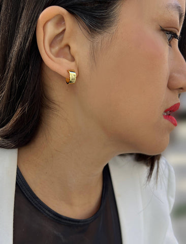 Image Title Female model wearing BOSS 18K GOLD VERMEIL OVER STERLING SILVER MINIMALIST CHUBBY MINI SMALL HOOP EARRINGS by Sonia Hou Jewelry