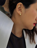 Female model wearing BOSS 18K GOLD VERMEIL OVER STERLING SILVER MINIMALIST CHUBBY MINI SMALL HOOP EARRINGS by Sonia Hou Jewelry