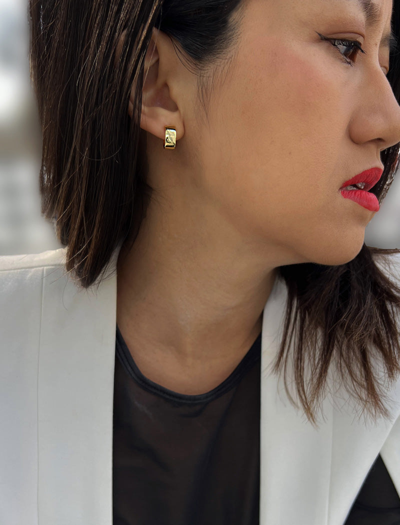 Image Title Female model wearing BOSS 18K GOLD VERMEIL OVER STERLING SILVER MINIMALIST CHUBBY MINI SMALL HOOP EARRINGS by Sonia Hou Jewelry
