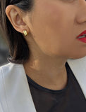 Female model wearing BOSS 18K GOLD VERMEIL OVER STERLING SILVER MINIMALIST CHUBBY MINI SMALL HOOP EARRINGS by Sonia Hou Jewelry