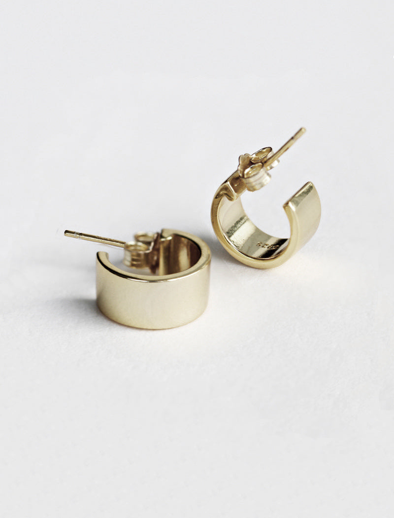 Image Title Minimalist dainty small thick bold everyday BOSS 925 Sterling Silver Chubby Mini Huggie Hoop Earrings by Sonia Hou, a celebrity Chinese AAPI demi-fine fashion costume jewelry designer
