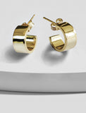 Image Title Minimalist dainty small thick bold everyday BOSS 925 Sterling Silver Chubby Mini Huggie Hoop Earrings by Sonia Hou, a celebrity Chinese AAPI demi-fine fashion costume jewelry designer