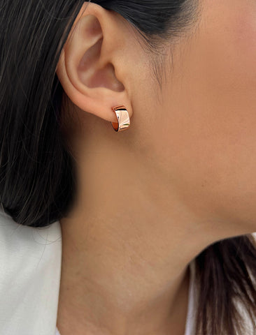 Image Title Female model wearing BOSS 18K ROSE GOLD VERMEIL OVER STERLING SILVER MINIMALIST CHUBBY MINI SMALL ROUND HOOP EARRINGS by Sonia Hou Jewelry