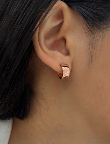 Image Title Female model wearing BOSS 18K ROSE GOLD VERMEIL OVER STERLING SILVER MINIMALIST CHUBBY MINI SMALL HOOP EARRINGS by Sonia Hou Jewelry