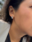 Image Title Female model wearing minimalist dainty small thick bold everyday BOSS 925 Sterling Silver Chubby Mini Huggie Hoop Earrings by Sonia Hou, a celebrity Chinese AAPI demi-fine fashion costume jewelry designer