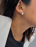 Image Title Female model wearing minimalist dainty small thick bold everyday BOSS 925 Sterling Silver Chubby Mini Huggie Hoop Earrings by Sonia Hou, a celebrity Chinese AAPI demi-fine fashion costume jewelry designer