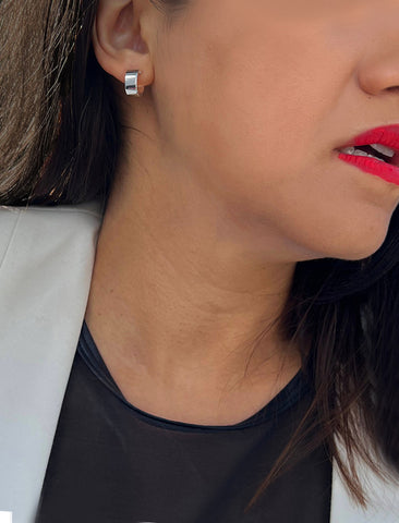 Image Title Female model wearing minimalist dainty small thick bold everyday BOSS 925 Sterling Silver Chubby Mini Huggie Hoop Earrings by Sonia Hou, a celebrity Chinese AAPI demi-fine fashion costume jewelry designer
