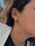 Image Title Female model wearing minimalist dainty small thick bold everyday BOSS 925 Sterling Silver Chubby Mini Huggie Hoop Earrings by Sonia Hou, a celebrity Chinese AAPI demi-fine fashion costume jewelry designer