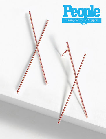 Image Title Asian Inspired Chopsticks Minimalist Long Thin Dangle Earrings in 18K Rose Gold Vermeil With Sterling Silver base by Sonia Hou, a celebrity AAPI demi-fine jewelry designer