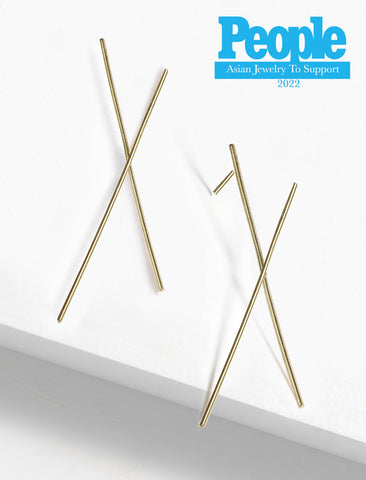 Image Title Asian Inspired Chopsticks Minimalist Long Thin Dangle Earrings in 925 Sterling Silver by Sonia Hou, a celebrity AAPI demi-fine jewelry designer