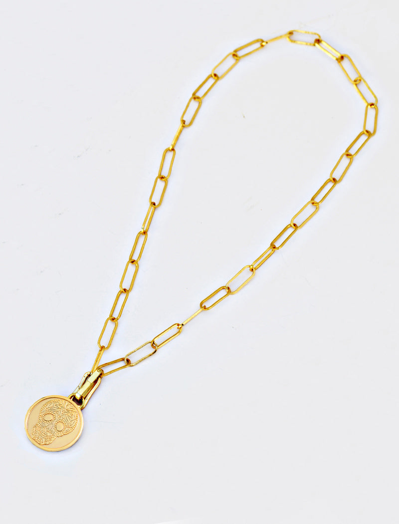 Image Title Gender neutral, culturally inclusive Day Of The Dead Mexican Sugar Skull Charm 3-Way Convertible Coin Pendant with a Large Paperclip Link Chain Statement Bold Thick Chunky Layering Stacking Rectangular Necklace in 18K Gold Vermeil Over Sterling Silver by Sonia Hou, a celebrity AAPI Chinese demi-fine jewelry designer. This holiday is also known as Dia De Los Muertos, and can also be worn for Halloween!
