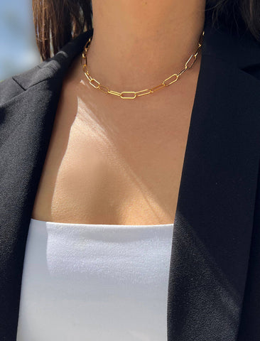 Image Title Female model wearing gender neutral, culturally inclusive Evil Eye Lucky Charm 3-Way Convertible Coin Pendant with a Large Paperclip Link Chain Statement Bold Thick Chunky Layering Stacking Rectangular Necklace in 18K Gold Vermeil Over Sterling Silver by Sonia Hou, a celebrity AAPI Chinese demi-fine jewelry designer.