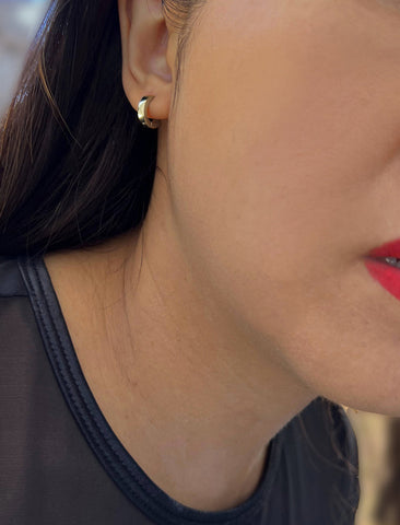 Image Title Woman wearing Essential Minimalist 925 Sterling Silver mini small tiny chunky bold thick dainty stacking layering statement round hoop huggie earrings by Sonia Hou, a celebrity Asian AAPI Chinese demi-fine jewelry designer