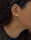 Image Title Woman wearing Essential Minimalist 925 Sterling Silver mini small tiny chunky bold thick dainty stacking layering statement round hoop huggie earrings by Sonia Hou, a celebrity Asian AAPI Chinese demi-fine jewelry designer