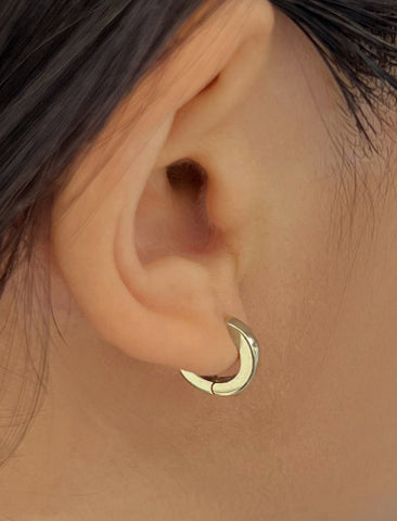 Image Title Woman wearing Essential Minimalist 925 Sterling Silver mini small tiny chunky bold thick dainty stacking layering statement round hoop huggie earrings by Sonia Hou, a celebrity Asian AAPI Chinese demi-fine jewelry designer
