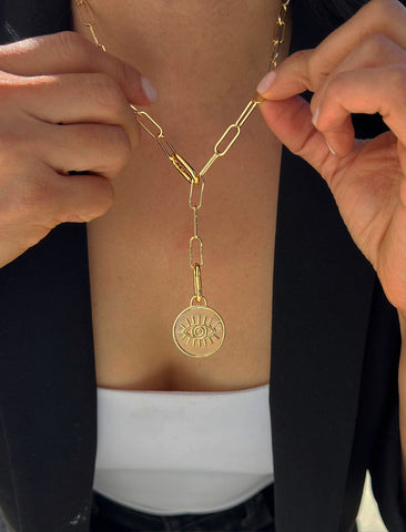 Image Title Female model wearing gender neutral, culturally inclusive Evil Eye Lucky Charm 3-Way Convertible Coin Pendant with a Large Paperclip Link Chain Statement Bold Thick Chunky Layering Stacking Rectangular Necklace in 18K Gold Vermeil Over Sterling Silver by Sonia Hou, a celebrity AAPI Chinese demi-fine jewelry designer.