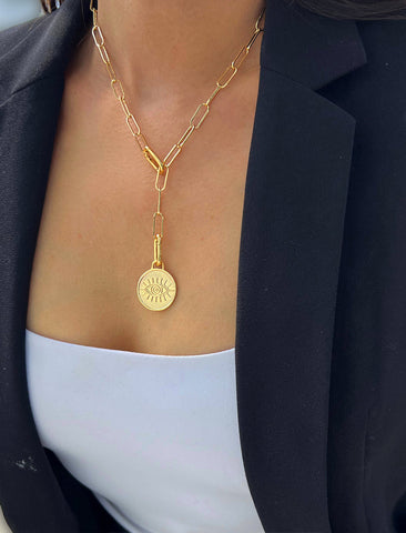 Image Title Female model wearing gender neutral, culturally inclusive Evil Eye Lucky Charm 3-Way Convertible Coin Pendant with a Large Paperclip Link Chain Statement Bold Thick Chunky Layering Stacking Rectangular Necklace in 18K Gold Vermeil Over Sterling Silver by Sonia Hou, a celebrity AAPI Chinese demi-fine jewelry designer.