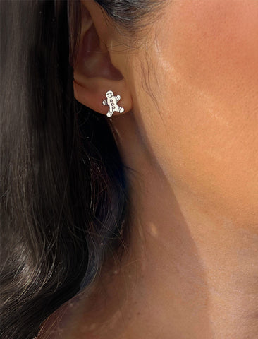 Image Title Female model wearing Gingerbread Holiday Festive Christmas Earrings in Sterling Silver by AAPI Celebrity Jewelry Designer Sonia Hou