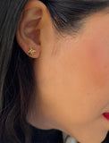 Image Title Female model wearing Holiday Sparkle Festive Christmas Earrings in 18K Gold Over With Sterling Silver by AAPI Celebrity Jewelry Designer Sonia Hou