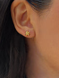 Image Title Female model wearing Holiday Sparkle Festive Christmas Earrings in 18K Gold Over With Sterling Silver by AAPI Celebrity Jewelry Designer Sonia Hou