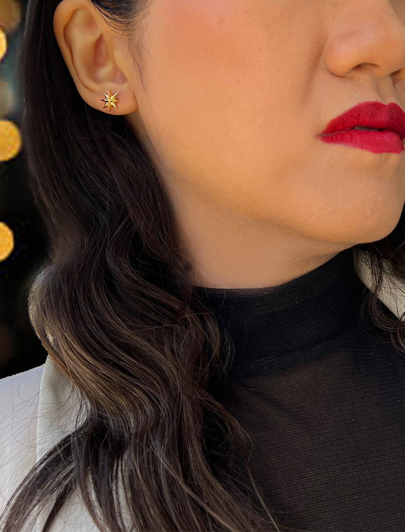 Image Title Female model wearing Holiday Sparkle Festive Christmas Earrings in 18K Gold Over With Sterling Silver by AAPI Celebrity Jewelry Designer Sonia Hou