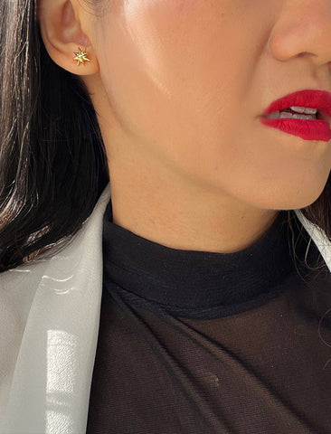 Image Title Female model wearing Holiday Sparkle Festive Christmas Earrings in Sterling Silver by AAPI Celebrity Jewelry Designer Sonia Hou