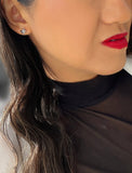 Image Title Female model wearing Holiday Sparkle Festive Christmas Earrings in Sterling Silver by AAPI Celebrity Jewelry Designer Sonia Hou