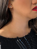 Image Title Female model wearing Holiday Sparkle Festive Christmas Earrings in Sterling Silver by AAPI Celebrity Jewelry Designer Sonia Hou