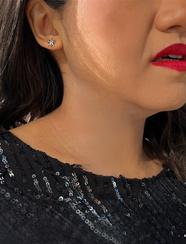 Image Title Female model wearing Holiday Sparkle Festive Christmas Earrings in Sterling Silver by AAPI Celebrity Jewelry Designer Sonia Hou