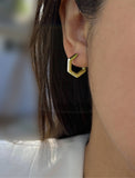 Image Title Woman wearing Minimalist mini tiny small chunky bold thick dainty stacking layering statement round INNOVATE Hexagon Huggie Hoop Earrings in 925 Sterling Silver by Sonia Hou, a celebrity Asian AAPI Chinese demi-fine jewelry designer