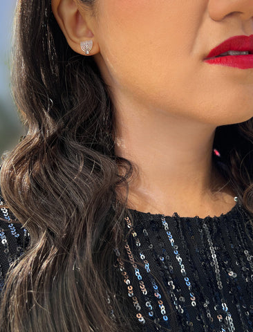 Image Title Female model wearing Menorah Jewish Hanukkah Holiday Festive Earrings in Sterling Silver by AAPI Celebrity Jewelry Designer Sonia Hou