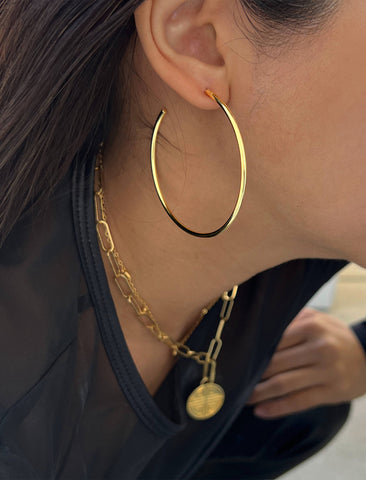 Image Title Female model wearing big medium large thin round circle PERFECT 50mm 2 inch hoop stacking lightweight everyday statement earrings in 18K Gold Vermeil With 925 Sterling Silver base by Sonia Hou, a celebrity AAPI Chinese demi-fine jewelry designer