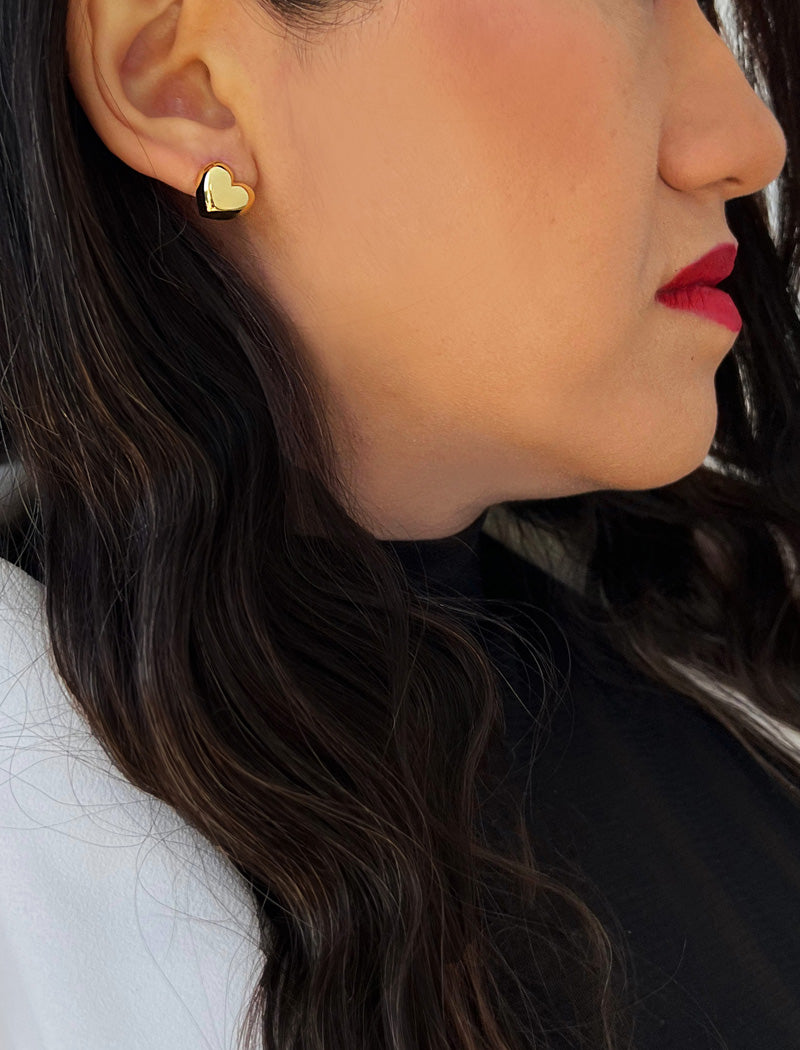 Image Title Woman wearing Puffy Heart Stud Earrings in 18K Gold Over Sterling Silver by AAPI Asian Celebrity Jewelry Designer Sonia Hou - Perfect for Valentine's Day Gift, Mother's Day, Anniversary