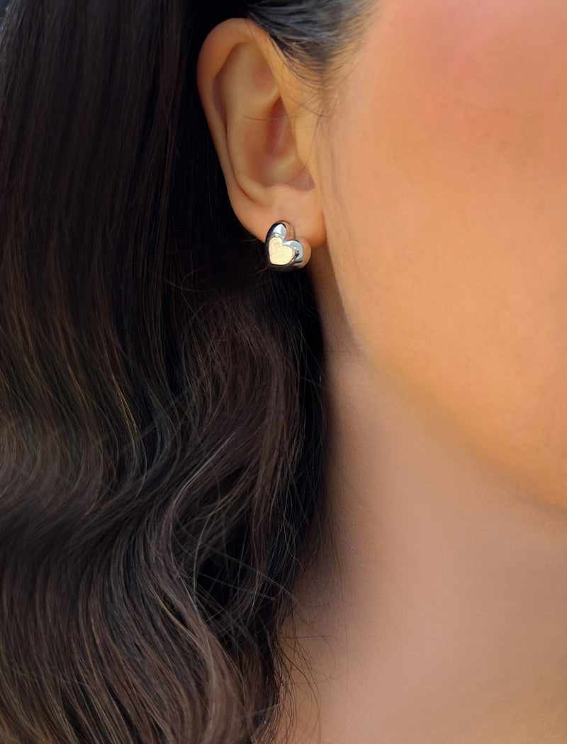 Image Title Woman wearing Puffy Heart Stud Earrings in Sterling Silver by AAPI Asian Celebrity Jewelry Designer Sonia Hou - Perfect for Valentine's Day Gift, Mother's Day, Anniversary