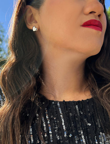 Image Title Woman wearing Puffy Heart Stud Earrings in Sterling Silver by AAPI Asian Celebrity Jewelry Designer Sonia Hou - Perfect for Valentine's Day Gift, Mother's Day, Anniversary