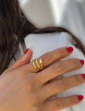Image Title Woman wearing Culturally inclusive Chinese Zodiac Wood Snake x Taylor Swift inspired Reputation ring in 18K Gold over Sterling Silver by Sonia Hou, a celebrity AAPI Chinese demi-fine jewelry designer. Perfect for Halloween, Lunar New Year or Swifties at Taylor Swift concerts!