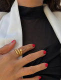 Image Title Woman wearing Culturally inclusive Chinese Zodiac Wood Snake x Taylor Swift inspired Reputation ring in 18K Gold over Sterling Silver by Sonia Hou, a celebrity AAPI Chinese demi-fine jewelry designer. Perfect for Halloween, Lunar New Year or Swifties at Taylor Swift concerts!