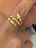 Image Title Woman wearing Culturally inclusive Chinese Zodiac Wood Snake x Taylor Swift inspired Reputation ring in 18K Gold over Sterling Silver by Sonia Hou, a celebrity AAPI Chinese demi-fine jewelry designer. Perfect for Halloween, Lunar New Year or Swifties at Taylor Swift concerts!