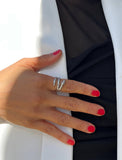 Image Title Woman wearing Culturally inclusive Chinese Zodiac Wood Snake x Taylor Swift inspired Reputation ring in Sterling Silver by Sonia Hou, a celebrity AAPI Chinese demi-fine jewelry designer. Perfect for Halloween, Lunar New Year or Swifties at Taylor Swift concerts!