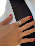 Image Title Woman wearing Culturally inclusive Chinese Zodiac Wood Snake x Taylor Swift inspired Reputation ring in Sterling Silver by Sonia Hou, a celebrity AAPI Chinese demi-fine jewelry designer. Perfect for Halloween, Lunar New Year or Swifties at Taylor Swift concerts!