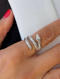 Image Title Woman wearing Culturally inclusive Chinese Zodiac Wood Snake x Taylor Swift inspired Reputation ring in Sterling Silver by Sonia Hou, a celebrity AAPI Chinese demi-fine jewelry designer. Perfect for Halloween, Lunar New Year or Swifties at Taylor Swift concerts!