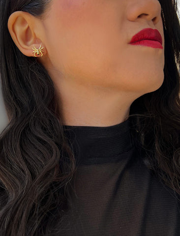 Image Title Woman wearing Gold Spider Halloween Earrings in 18K Gold Over With Sterling Silver by AAPI Celebrity Jewelry Designer Sonia Hou