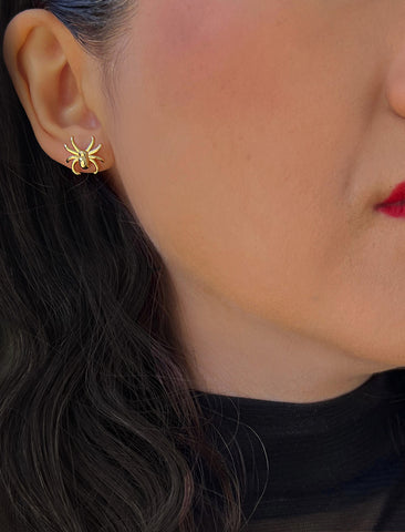 Image Title Woman wearing Gold Spider Halloween Earrings in 18K Gold Over With Sterling Silver by AAPI Celebrity Jewelry Designer Sonia Hou