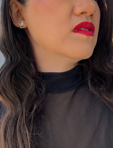 Image Title Woman wearing Silver Spider Halloween Earrings in Sterling Silver by AAPI Celebrity Jewelry Designer Sonia Hou