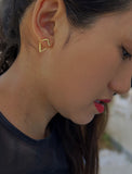 Image Title Female model wearing small modern geometric minimalist simple 2-way convertible TRILL dainty wishbone diamond front back ear jacket stud earrings in 18K gold vermeil with 925 sterling silver base by Sonia Hou, a celebrity AAPI Chinese demi-fine fashion costume jewelry designer
