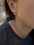 Image Title Female model wearing small modern geometric minimalist simple 2-way convertible TRILL dainty wishbone diamond front back ear jacket stud earrings in 18K gold vermeil with 925 sterling silver base by Sonia Hou, a celebrity AAPI Chinese demi-fine fashion costume jewelry designer