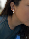 Image Title Female model wearing small modern geometric minimalist simple 2-way convertible TRILL dainty wishbone diamond front back ear jacket stud earrings in 925 sterling silver by Sonia Hou, a celebrity AAPI Chinese demi-fine fashion costume jewelry designer